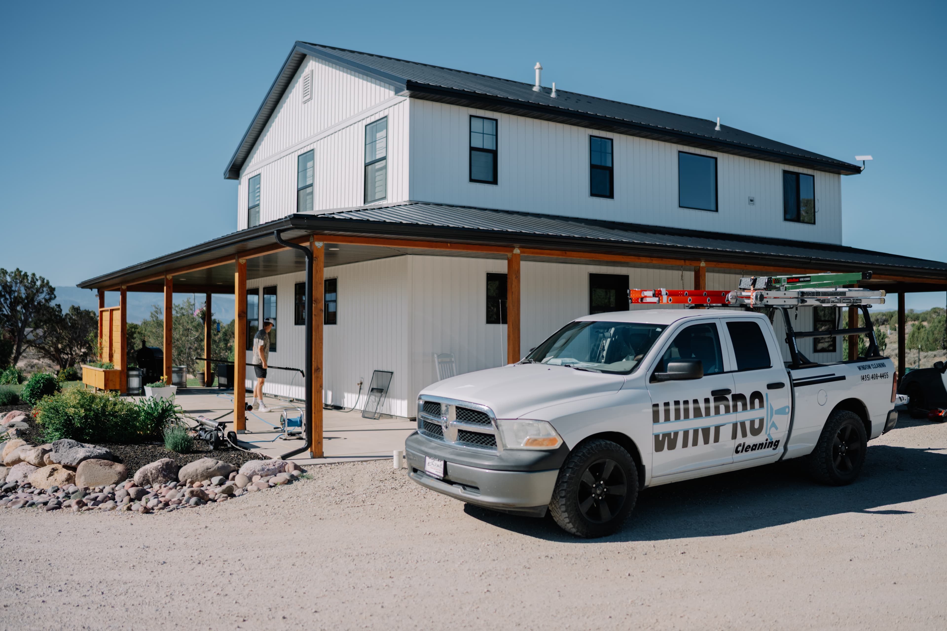 Branded truck in front of home